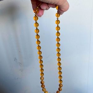 18 inch beaded necklace . 18 inches long.  Very pretty.